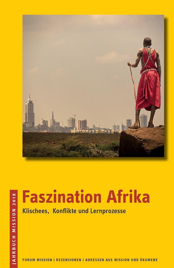 Jahrbuch 2018: Rotes Cover mit Titelbezeichnung im linken unteren Bereich. Im oberen Bereich ist ein Bild. Motiv: Traditionell gekleideter Masai vor der Skyline von Nairobi© Foto: Images/Getty Images